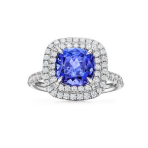 Anillo plateado con diamante azul